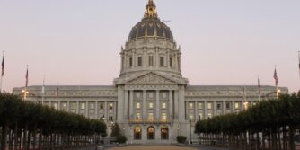 A wide shot of San Francisco City Hall